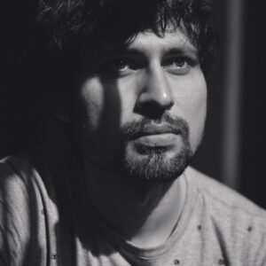 Photo by Jyotirmoy Gupta grayscale photography of man looking upward